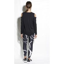 Load image into Gallery viewer, Black and white leggings available at Studio 128. 
