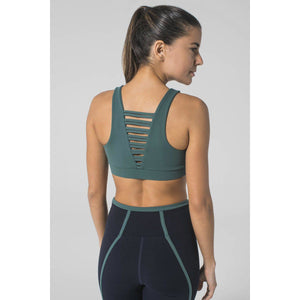 Stylish strappy sports bras available at Studio 128. 