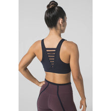 Load image into Gallery viewer, Navy sports bras from Studio 128. 
